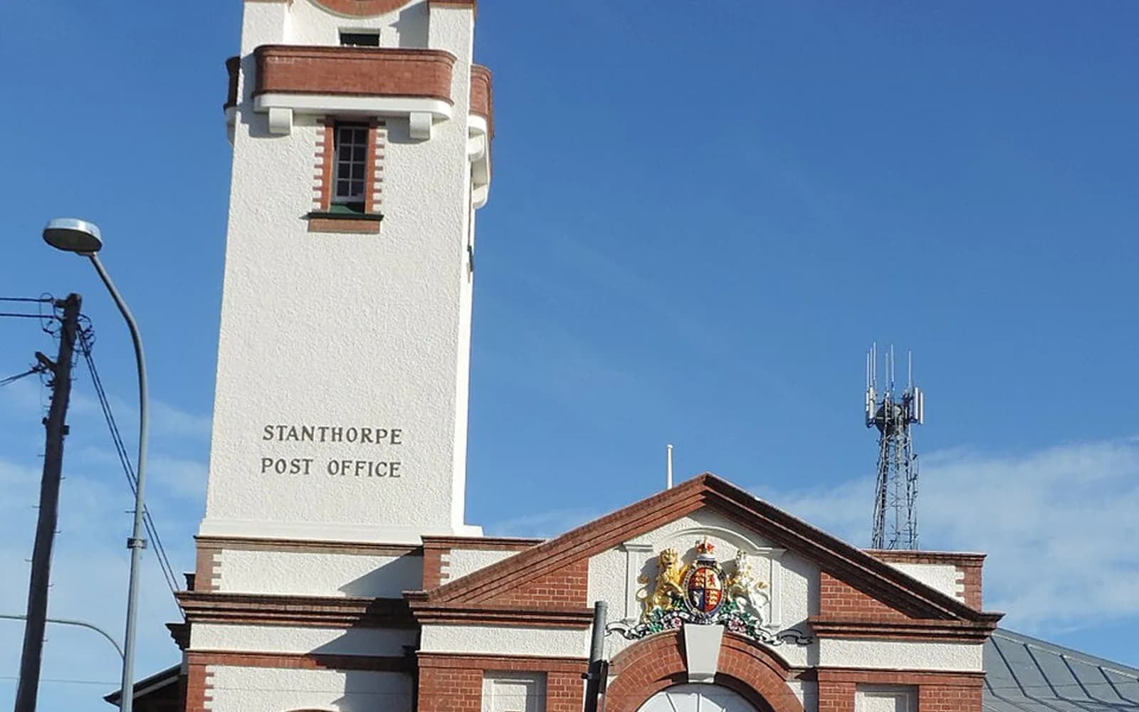 The heritage Stanthorpe Post Office against a clear blue sky